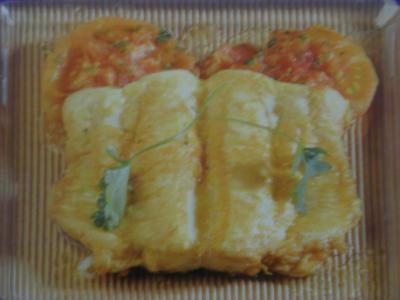 Pescadilla a la roma con tomates